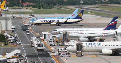 Planes parked at terminal of Bologna BLQ Airport