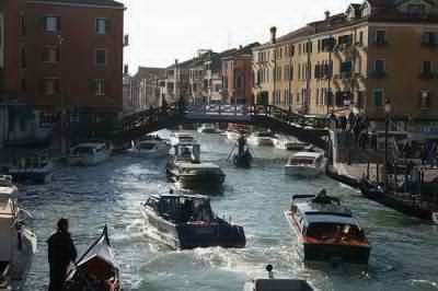 Venice canal busy with boats